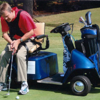 Golf is best played in an adaptive cart like the one you see here. They are allowed all over the fairways and on the greens but not in the traps. SolorRiders, Golf Xpress Carts and ParaGolf Carts are the three most common. I use a carbon fiber glove to grip the woods and irons and put with a different grip. Golf is still as difficult as it ever was!