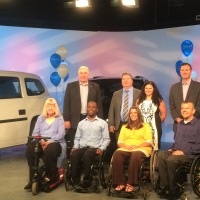 One of my favorite jobs as spokesperson for National Mobility Awareness Month is being a part of the television announcement of the winners. Here I'm joining the 2014 Local Heroes Contest winners (3 in wheelchairs to my right and the Canadian couple in the middle rear who are raising two disabled sons).