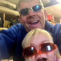 What do you do when your two year old discovers a pile of old crazy racing sunglasses sent by a sponsor? You put them on however you want and snap selfies of course.